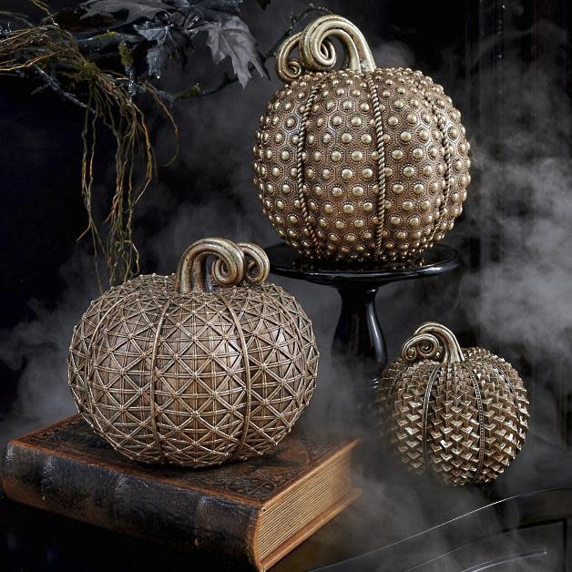 <p><a href="https://go.redirectingat.com?id=74968X1596630&url=https%3A%2F%2Fwww.grandinroad.com%2Fgeometric-gold-pumpkins-2c-set-of-three%2Fhalloween-haven%2Findoor-decor%2F1384855&sref=https%3A%2F%2Fwww.housebeautiful.com%2Fshopping%2Fhome-accessories%2Fg963%2Felegant-halloween-home-decorations%2F" rel="nofollow noopener" target="_blank" data-ylk="slk:Shop Now;elm:context_link;itc:0;sec:content-canvas" class="link ">Shop Now</a></p><p>Geometric Gold Pumpkins, Set of Three</p><p>$99.50</p><p>grandinroad.com</p>