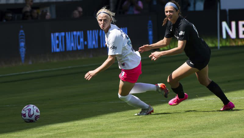 San Diego Wave defender Madison Pogarch, left, competes with Washington Spirit forward Ashley Hatch for control of the ball during an NWSL soccer match on Saturday, May 6, 2023, in Washington. Hatch was recently called up to the USWNT and could be playing on it when the team comes to Salt Lake City for an friendly next month.