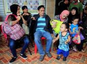 Rescued residents take a rest after they were rescued from their homes in Marawi city, Philippines June 21, 2017. REUTERS/Romeo Ranoco