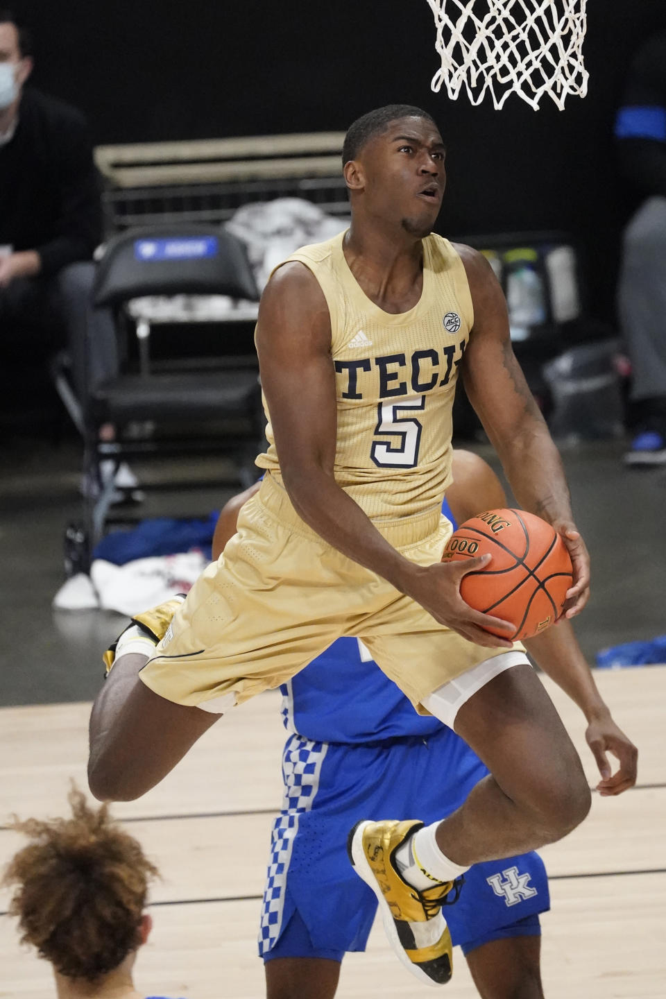 Georgia Tech forward Moses Wright (5) scores against Kentucky during the first half of an NCAA college basketball game Sunday, Dec. 6, 2020, in Atlanta. (AP Photo/John Bazemore)