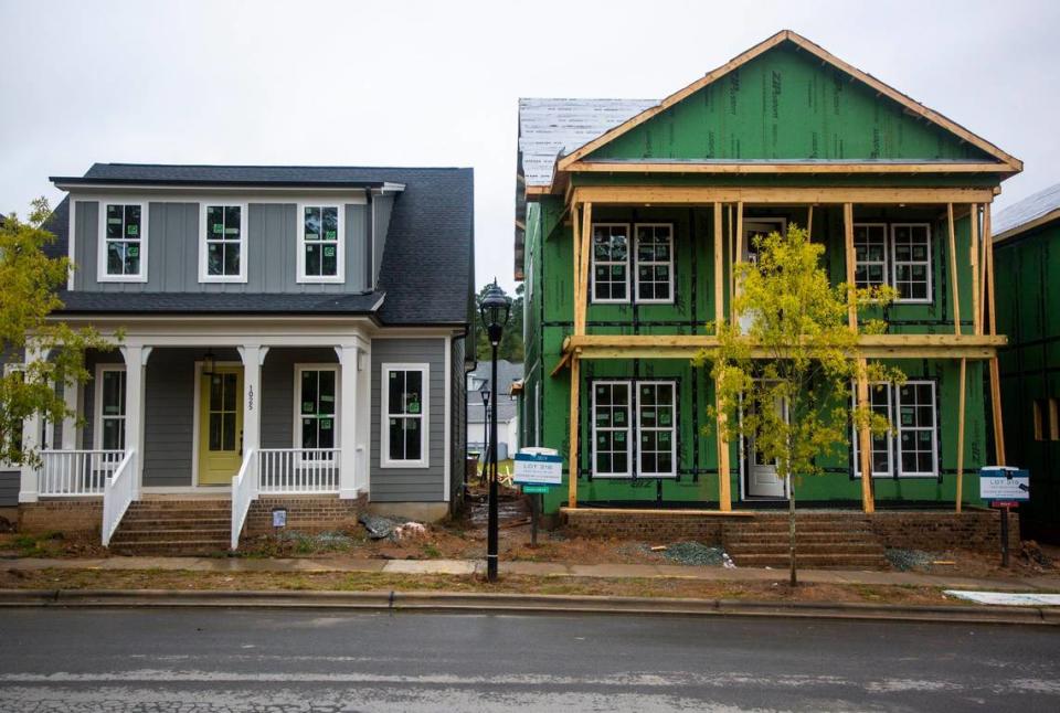 Houses in various states of completion are seen side by side in 751 South, a development in Durham, N.C., on Friday, Sept. 25, 2020.