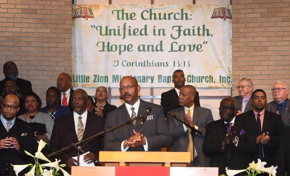 Congregations from three historically black churches held a Palm Sunday service intended to uplift the community after tragedy.