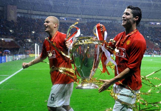 Cristiano Ronaldo celebrates with Wes Brown following the Champions League win in 2008.