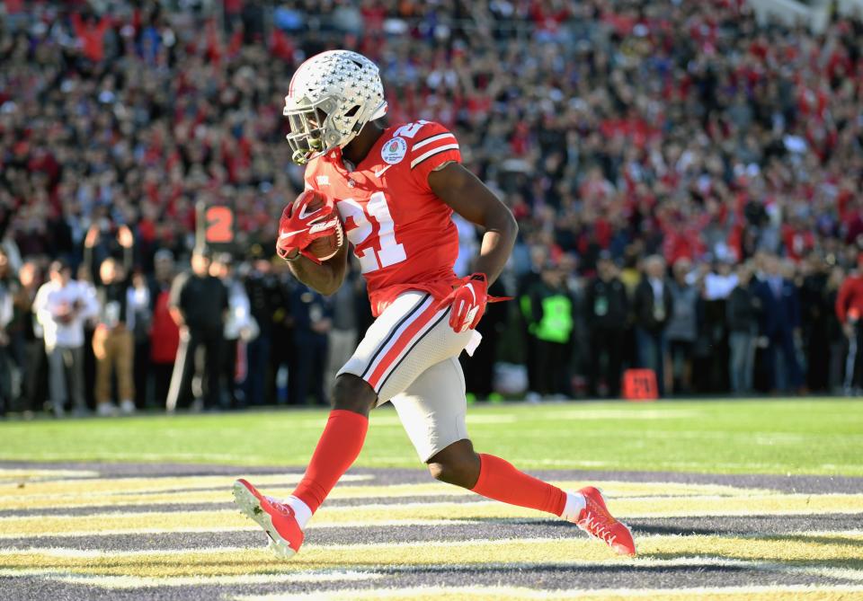 Ohio State Buckeyes wide receiver Parris Campbell (21) scores against Washington in the Rose Bowl.