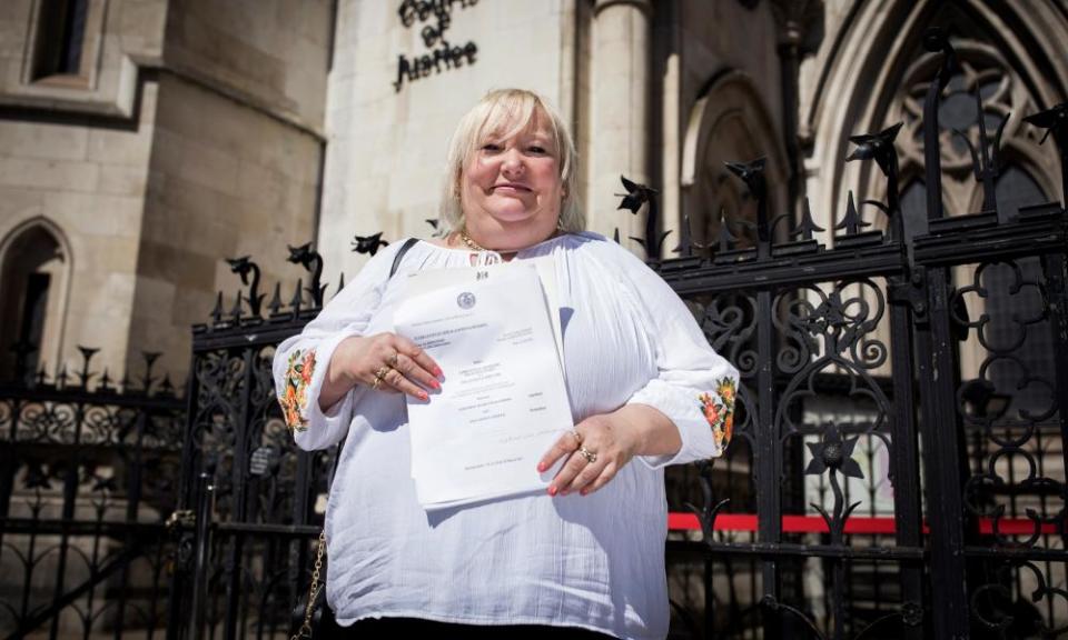 Della Robinson, 53, outside the Royal Courts of Justice, London.