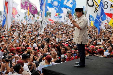 FILE PHOTO: Prabowo Subianto, who is Indonesia's presidential candidate for the upcoming general election, speaks during his campaign rally in Bogor, West Java province, Indonesia, March 29, 2019. REUTERS/Willy Kurniawan/File Photo