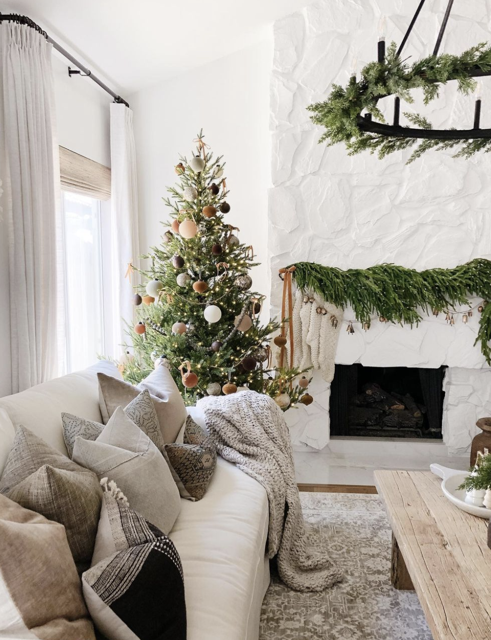 a living room with a christmas tree