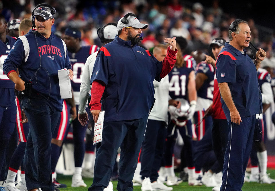 Joe Judge, offensive assistant/quarterbacks coach, Matt Patricia, senior football advisor/offensive line, and Bill Belichick, head coach of the New England Patriots. The Patriots dropped their preseason opener to the New York Giants, 23-21. (Photo by Barry Chin/The Boston Globe via Getty Images)