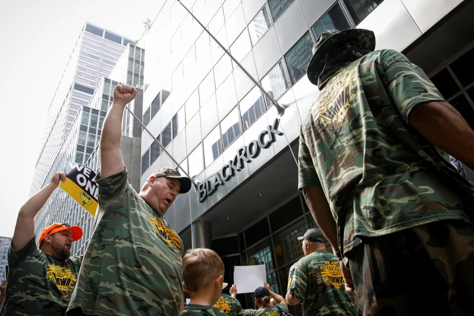 Members of United Mine Workers of America (UMWA) and other labor leaders picket about the union's strike at Warrior Met Coal Mine, outside BlackRock's Headquarters in New York City, U.S., July 28, 2021.  REUTERS/Brendan McDermid