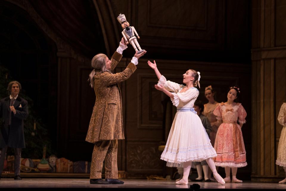 Louisville Ballet's Amber Wickey as Marie With Herr Drosselmeyer Harald Uwe Kern in the 2022 production of "The Brown-Forman Nutracker."