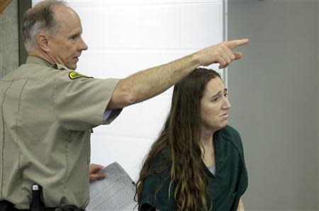 Megan Huntsman appears in court in Provo, Utah April 21, 2014. REUTERS/Rick Bowmer/Pool