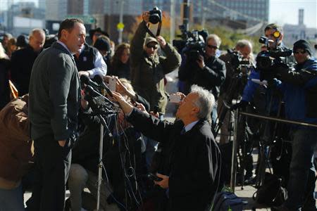 Sean McGonagle, son of murder victim Paul McGonagle, talks to reporters outside the courthouse on the first of two days of convicted mobster James "Whitey" Bulger's sentencing hearing in Boston, Massachusetts November 13, 2013. REUTERS/Brian Snyder