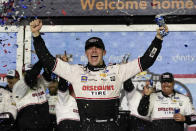 Austin Cindric celebrates in Victory Lane after winning the NASCAR Daytona 500 auto race at Daytona International Speedway, Sunday, Feb. 20, 2022, in Daytona Beach, Fla. (AP Photo/John Raoux)