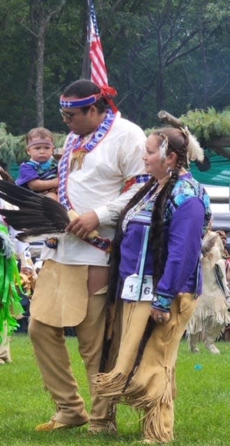 Mashpee Wampanoag Tribe members Brian Weeden, Keturah Peters and their son Epenow, are wearing Eastern Woodland tribal regalia. Preschool dress-up days that include Native American-themed attire "could give children a distorted view of who we are as tribal people," Weeden said.