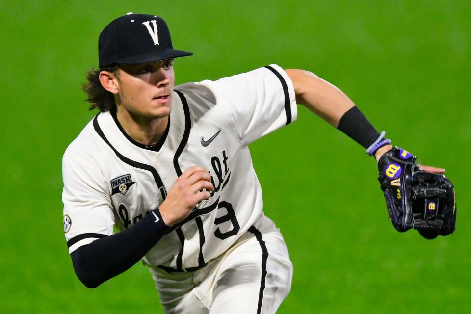 Vanderbilt's Carter Young plays in an NCAA college baseball game against Eastern Kentucky on Tuesday, April 13, 2021, in Nashville, Tenn. (AP Photo/John Amis)