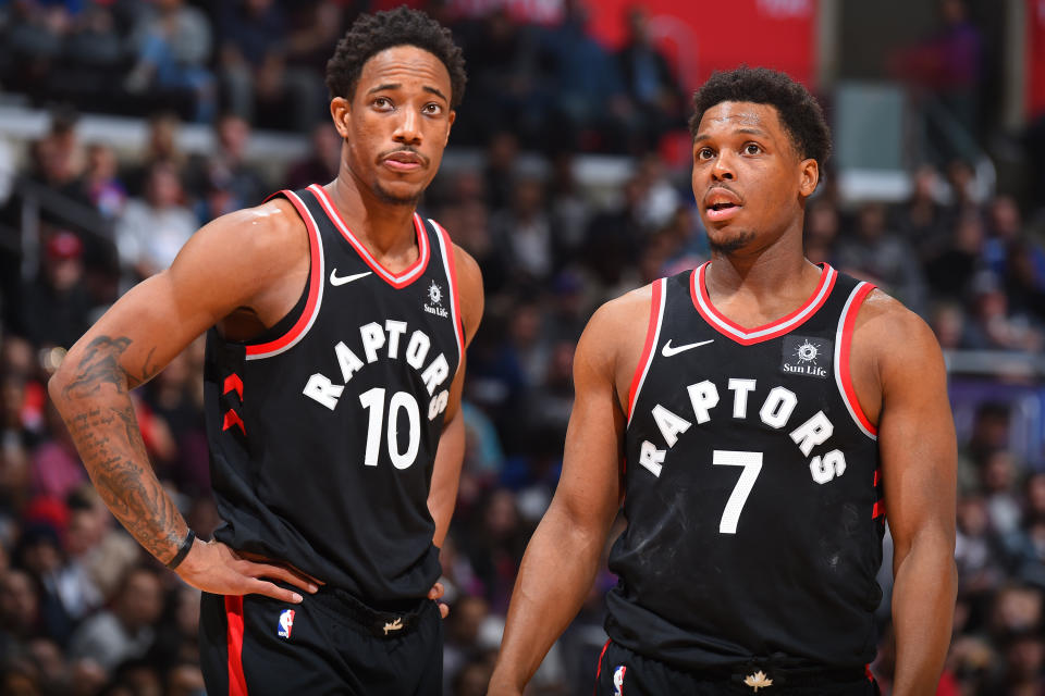 DeMar DeRozan and Kyle Lowry are sharing the ball more this season. (Getty)