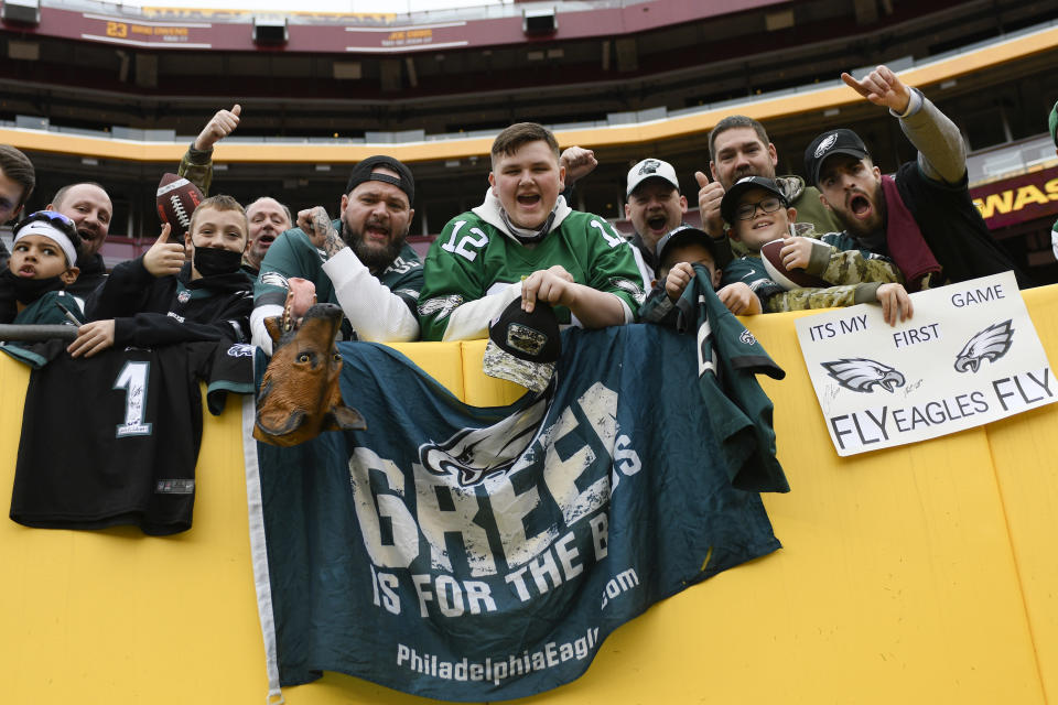 Fans are seen in the stands prior to the start of the first half of an NFL football game between Philadelphia Eagles and Washington Football Team, Sunday, Jan. 2, 2022, in Landover, Md. (AP Photo/Mark Tenally)