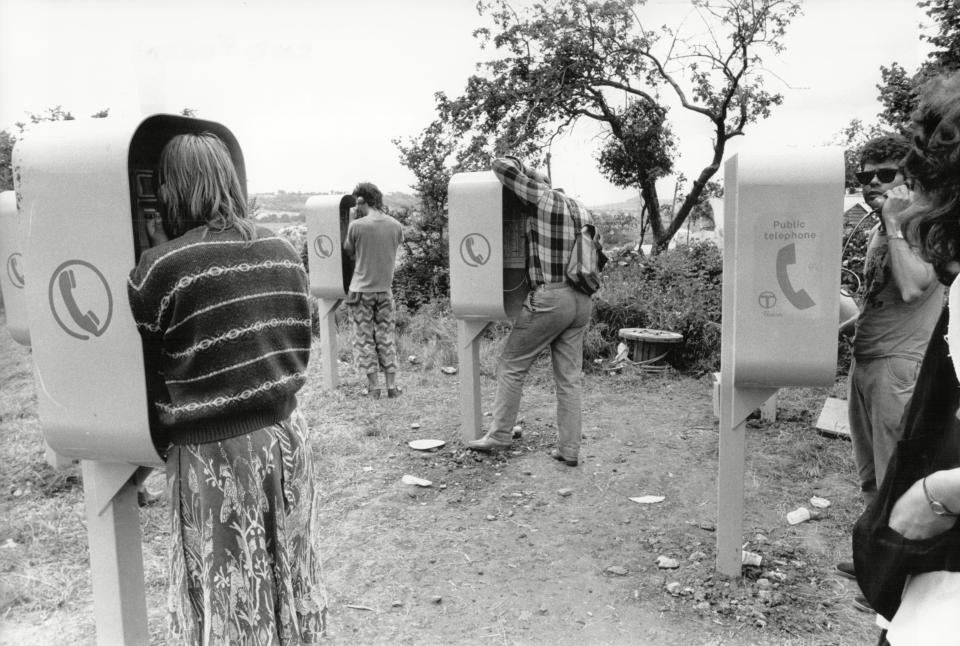 Telephones at Glastonbury in 1985 (David O'Neil/ANL/Shutterstock)