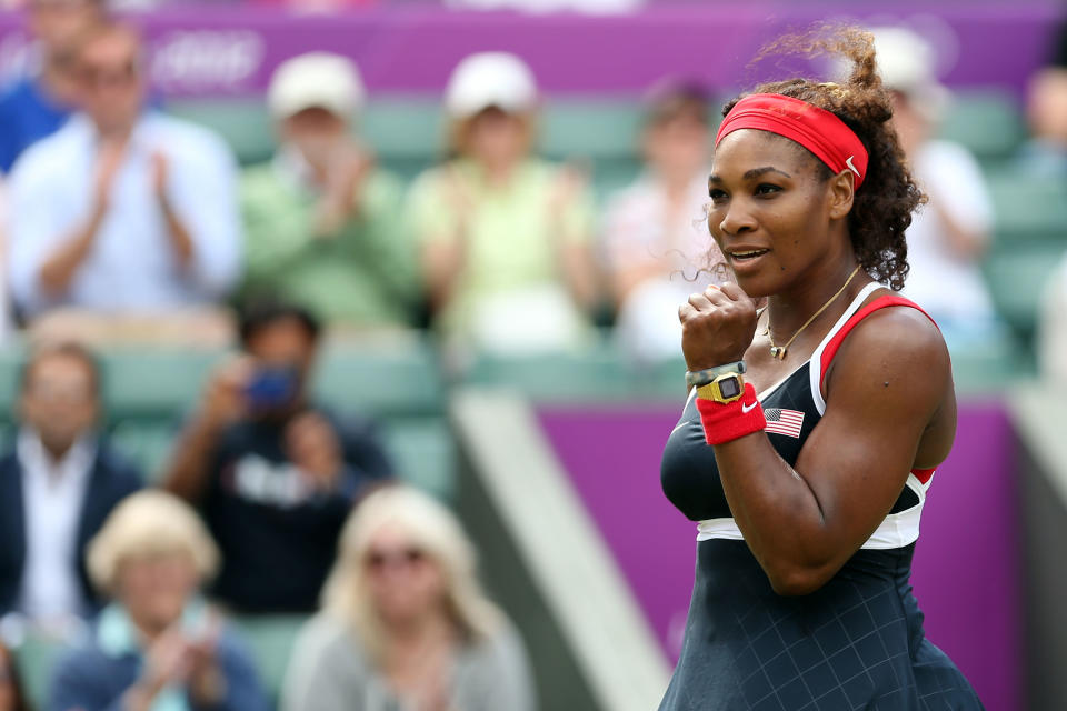 LONDON, ENGLAND - AUGUST 02: Serena Williams of the United States celebrates after defeating Caroline Wozniacki of Denmark in the Quarterfinals of Women's Singles Tennis on Day 6 of the London 2012 Olympic Games at Wimbledon on August 2, 2012 in London, England. (Photo by Clive Brunskill/Getty Images)