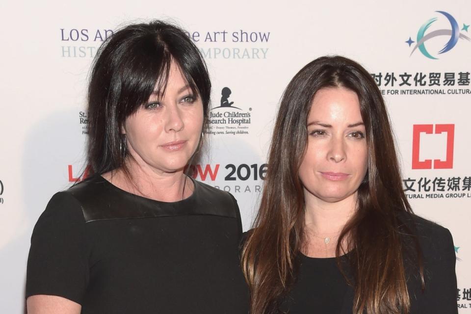 Shannen Doherty and Holly Marie Combs, pictured in 2016, have remained close friends since starring in Charmed together (Getty Images)