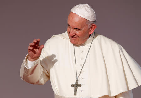 Pope Francis waves as he arrives at Tocumen International airport for World Youth Day in Panama City, Panama January 23, 2019. REUTERS/Carlos Jasso/Files