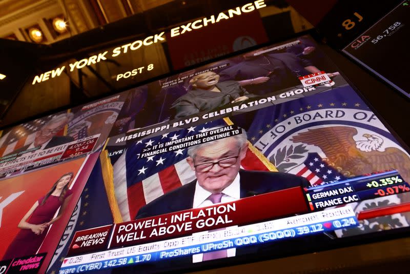 FILE PHOTO: Federal Reserve Chair Jerome Powell interest rate announcement on the trading floor at New York Stock Exchange (NYSE) in New York City