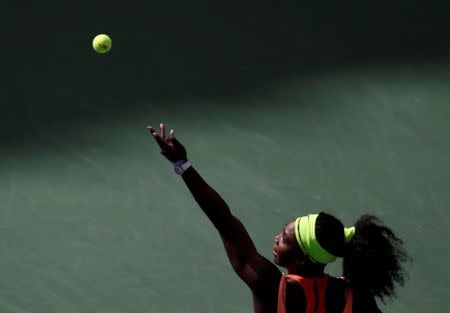 Serena Williams of the U.S. serves to Roberta Vinci of Italy during their women's singles semi-final match at the U.S. Open Championships tennis tournament in New York, September 11, 2015. REUTERS/Carlo Allegri Picture Supplied by Action Images