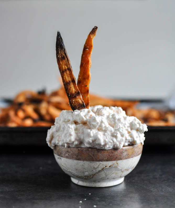 <strong>Get the <a href="http://www.howsweeteats.com/2013/01/garlic-butter-sweet-potato-fries-with-creamy-feta-dip/">Garlic Butter Sweet Potato Fries with Creamy Feta Dip recipe</a> from How Sweet It Is</strong>