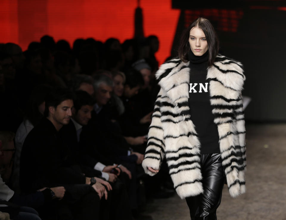 The Fall 2014 DKNY collection is modeled during Fashion Week in New York, Sunday, Feb. 9, 2014. (AP Photo/Seth Wenig)