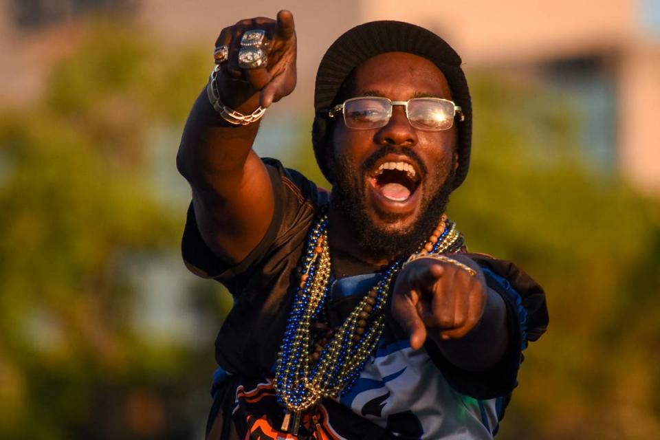 A parade participant cheers during the 2018 DeSoto Grand Parade in Bradenton. Andres Leiva/Special to the Herald