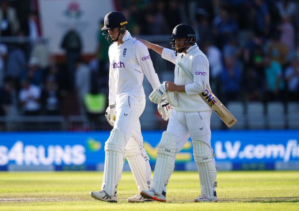 Zak Crawley, left, gets a deserved pat on the back from England team-mate Jonny Bairstow (David Davies/PA) (PA Wire)
