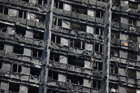 The burnt out remains of the Grenfell Tower are seen in North Kensington, London, Britain June 20, 2017. REUTERS/Marko Djurica