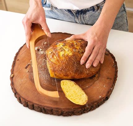 A delightfully efficient wooden bread bow knife