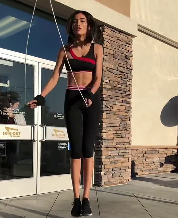 Model Kelly Gale jumped rope right in front of the entrance to an In-N-Out Burger. (Photo: Instagram/kellybellyboom)