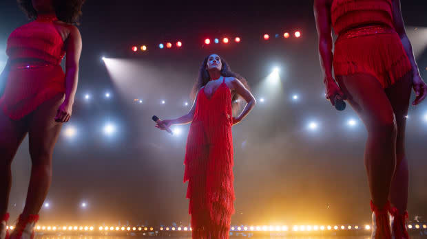 Grace on stage in her custom-built jumpsuit.