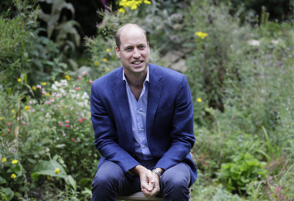 Britain's Prince William, Duke of Cambridge socially distances as he speaks with service users during a visit to the Garden House of the Light Project in Peterborough, on July 16, 2020, which offers information, advice and support to the rough sleepers in Peterborough. (Photo by Kirsty Wigglesworth / POOL / AFP) (Photo by KIRSTY WIGGLESWORTH/POOL/AFP via Getty Images)