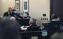 Prosecutor Tamara Strauch points to defendant Otis McKane during closing statements on day 11 of the McKane's capital murder trial for the 2016 shooting of SAPD detective Benjamin Marconi on Monday, July 26, 2021. (Kin Man Hui/The San Antonio Express-News via AP)