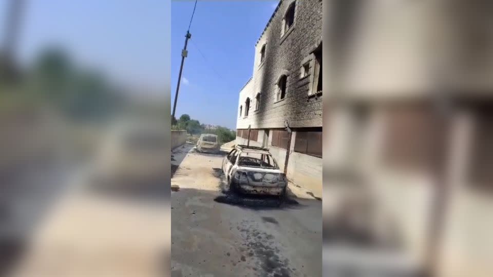 A screen grab from video obtained by CNN shows cars in the village of Duma in the West Bank on April 13. - Obtained by CNN