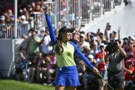 Paula Reto, of South Africa, celebrates after winning the the Canadian Pacific Women's Open golf tournament in Ottawa, on Sunday, Aug. 28, 2022. (Justin Tang/The Canadian Press via AP)