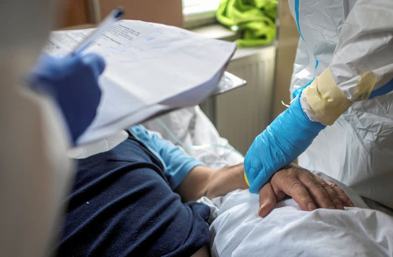 Medical specialists treat patients suffering from the coronavirus disease at a hospital in Gliwice