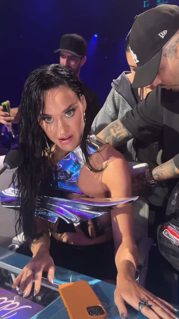 Katy Perry narrowly avoided an embarrassing moment on “American Idol” Monday night when her top burst open in the middle of a live show. @katyperry/Instagram