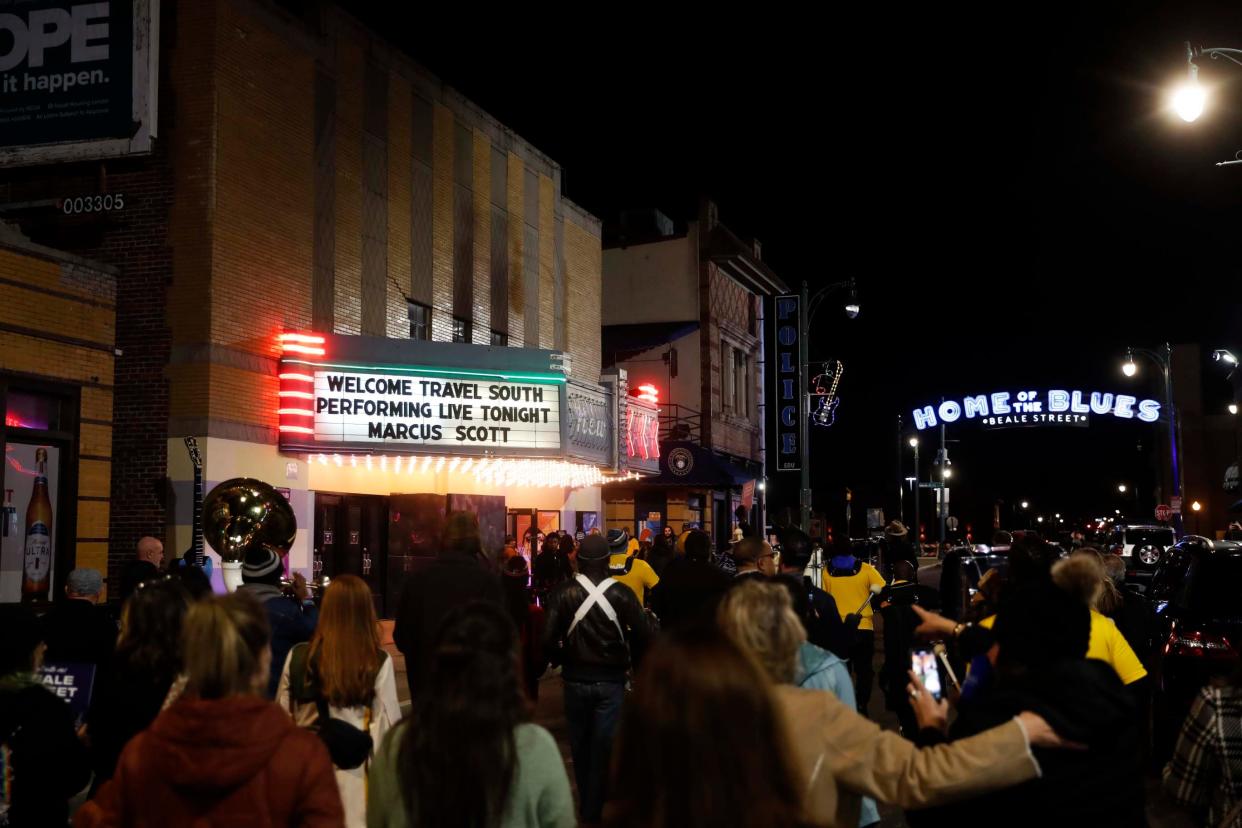 Travel professionals parade down Beale Street in Memphis as part of the Travel South International Showcase, hosted by Memphis Tourism, on Monday, Dec. 4, 2023. 400 travel professionals from around the world were in Memphis for the showcase.