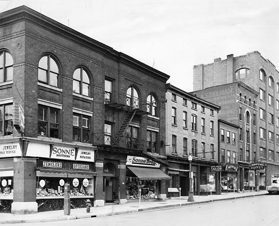 The block of Washington Street in downtown Utica — between Columbia and Pearl streets — no longer exists and is now part of the rear of the Delta Hotels by Marriott complex. In the late 1940s, however, it was the home of several businesses including Sonne Brothers jewelers and opticians; Dr. Arthur Faass, dentist; Louis Scalise violin studio; Al Sittig Entertainment Services; David Arlen, tailor; and the Chippewa Buffet.