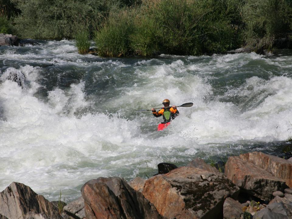 Kayaker on the Rogue River in Oregon.