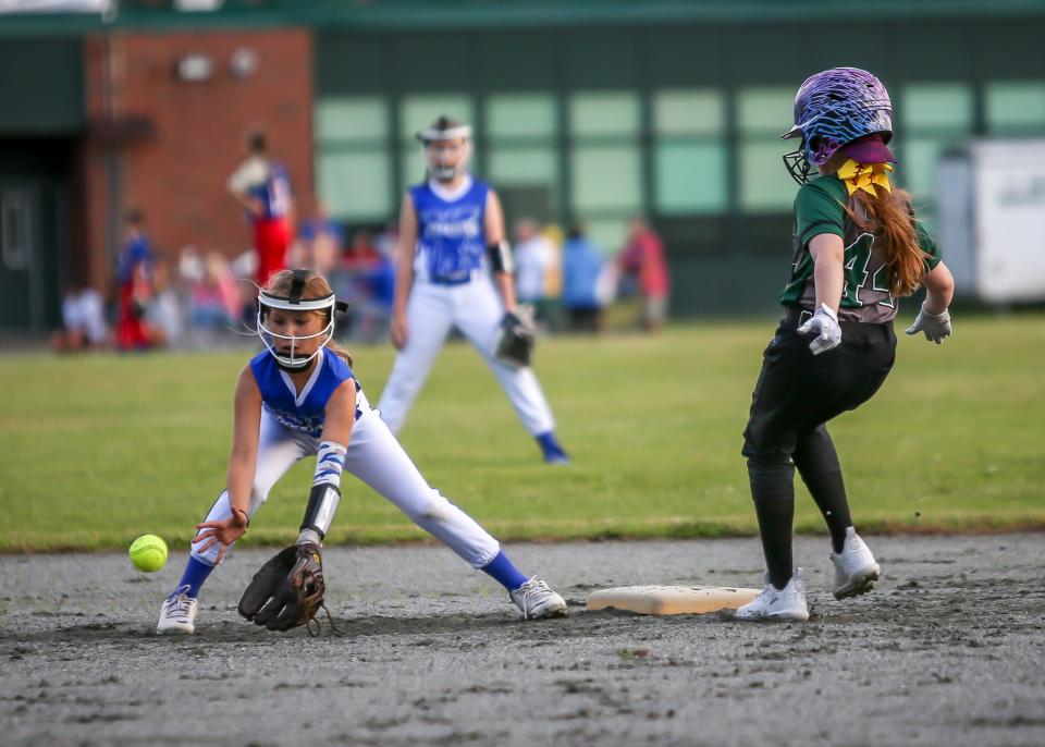 Firestorm shortstop Lexi Pequita takes the throw from her catcher as Dartmouth Dynamite's Cameron Cote succesfully steals second base on Friday evening.