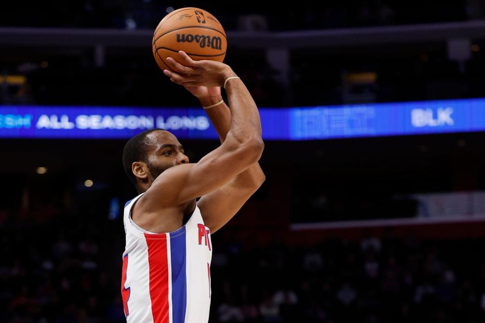 Detroit Pistons guard Alec Burks (14) shoots in the first half against the Toronto Raptors at Little Caesars Arena in Detroit on Saturday, Dec. 30, 2023.