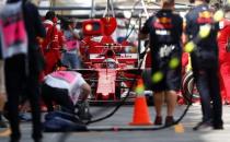 Formula One - F1 - Australian Grand Prix - Melbourne, Australia - 24/03/2017 Ferrari driver Kimi Raikkonen from Finland sits in the pits during the first practice session. REUTERS/Brandon Malone