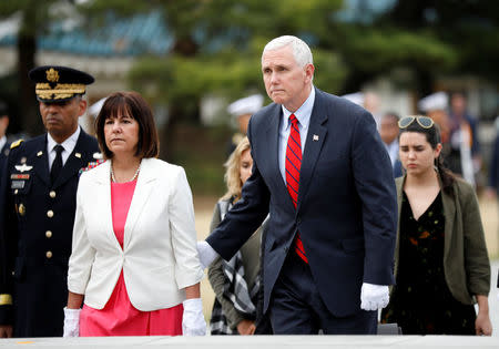 U.S. Vice President Mike Pence visits the National Cemetery in Seoul, South Korea, April 16, 2017. REUTERS/Kim Hong-Ji