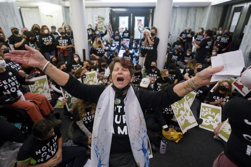 FILE - Demonstrators stage a sit-in demanding a cease-fire in the Israel-Hamas war on Nov. 13, 2023, in Oakland, Calif. (AP Photo/Godofredo A. Vásquez, File)