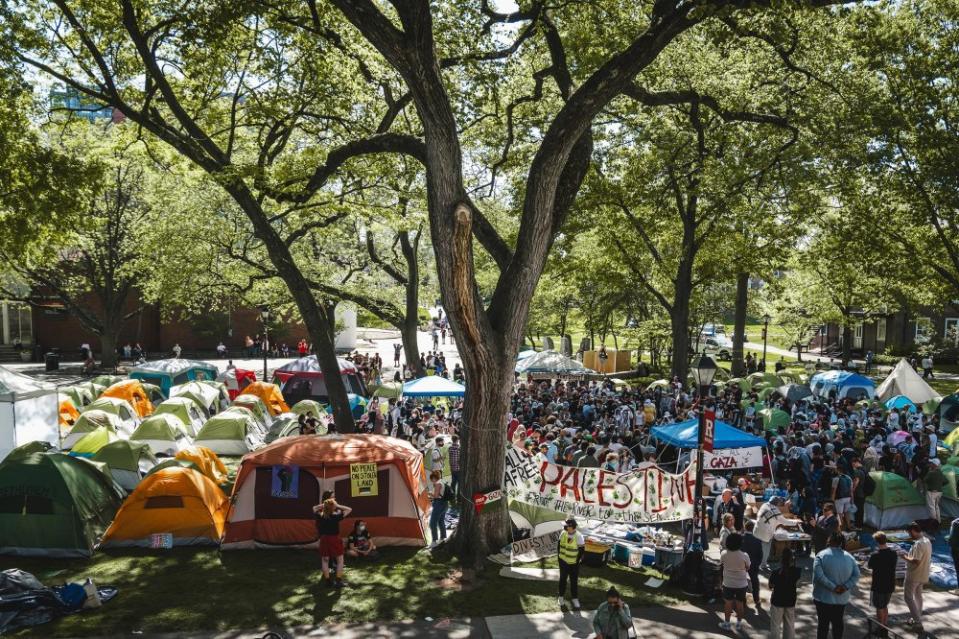 Tents surround protesters as they gather at Rutgers University's College Avenue campus.<span class="copyright">Evan Leong for The Daily Targum</span>